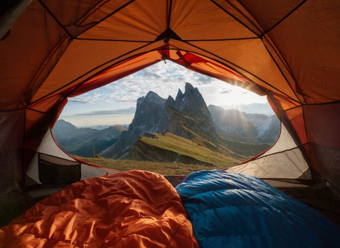 View from tent to the mountain. Sport and active life concept